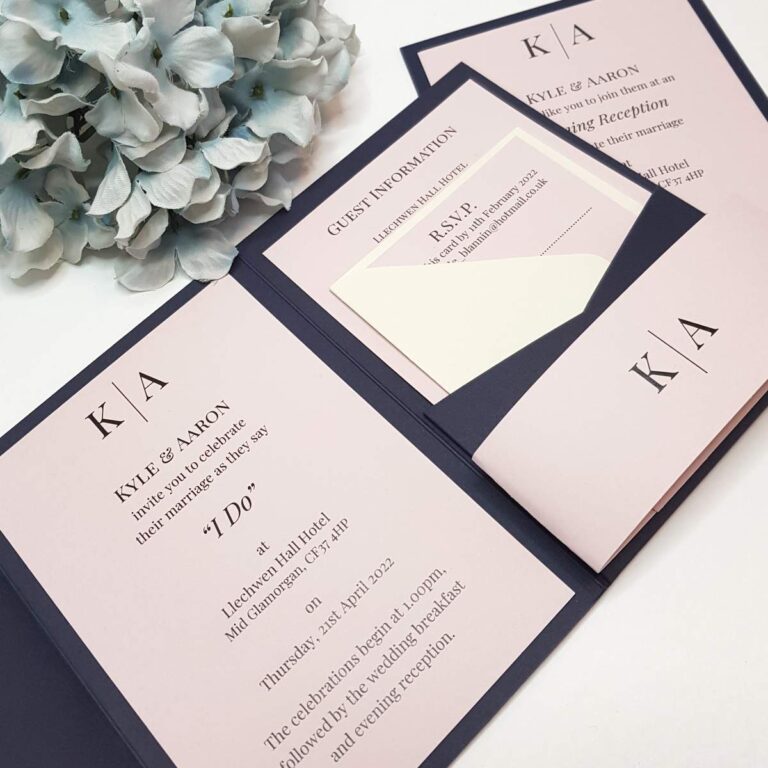 modern monogram navy and blush pocketfold wedding invitations 768x768